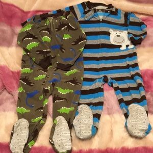 2 Carter’s zip up footie pajamas